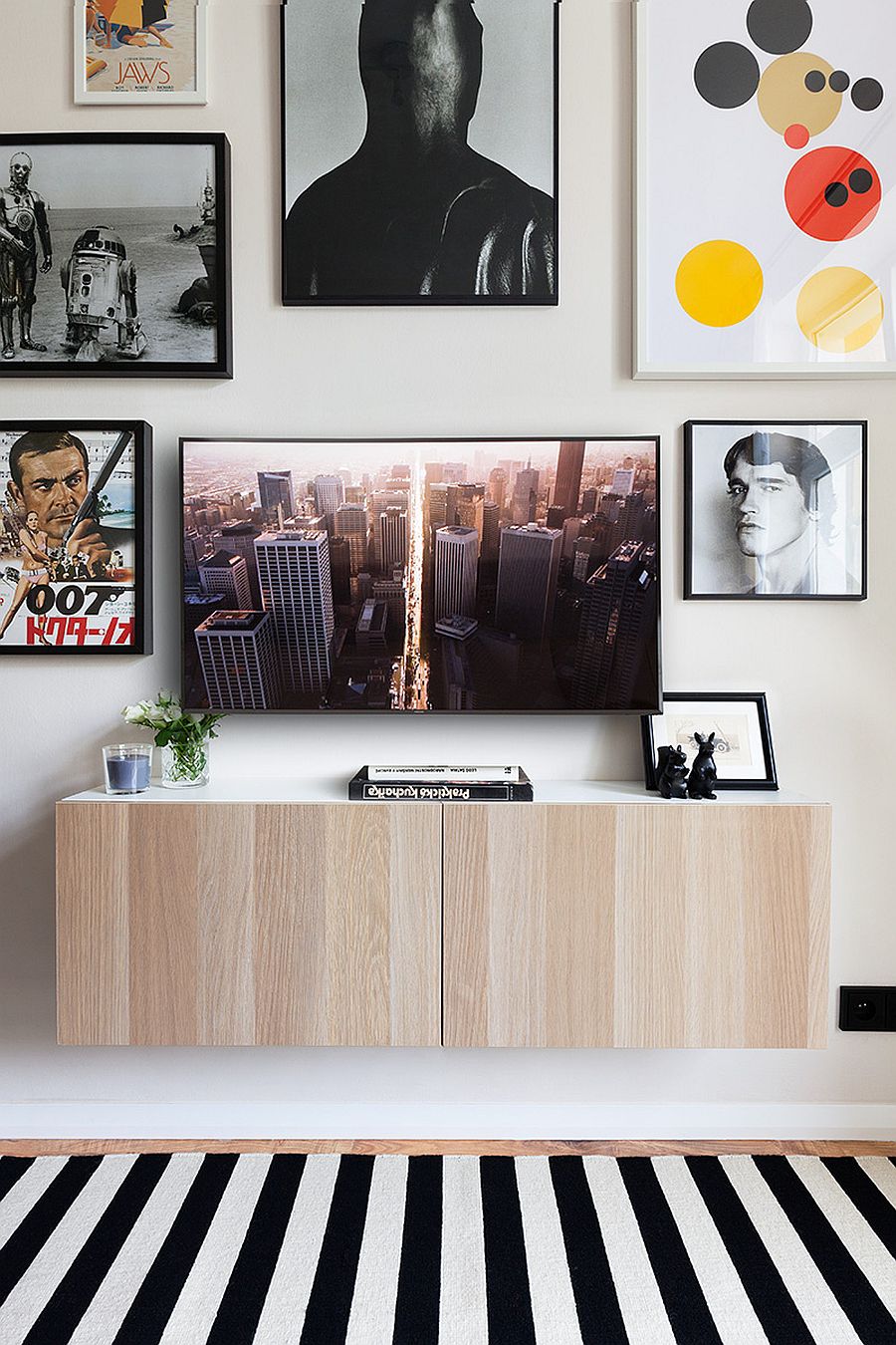 Artwork combined with framed posters and fun prints to create a cool gallery wall