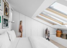 Attic-in-white-bedroom-with-a-series-of-skylights-217x155