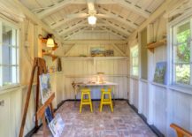 Barn-studio-with-two-yellow-stools--217x155