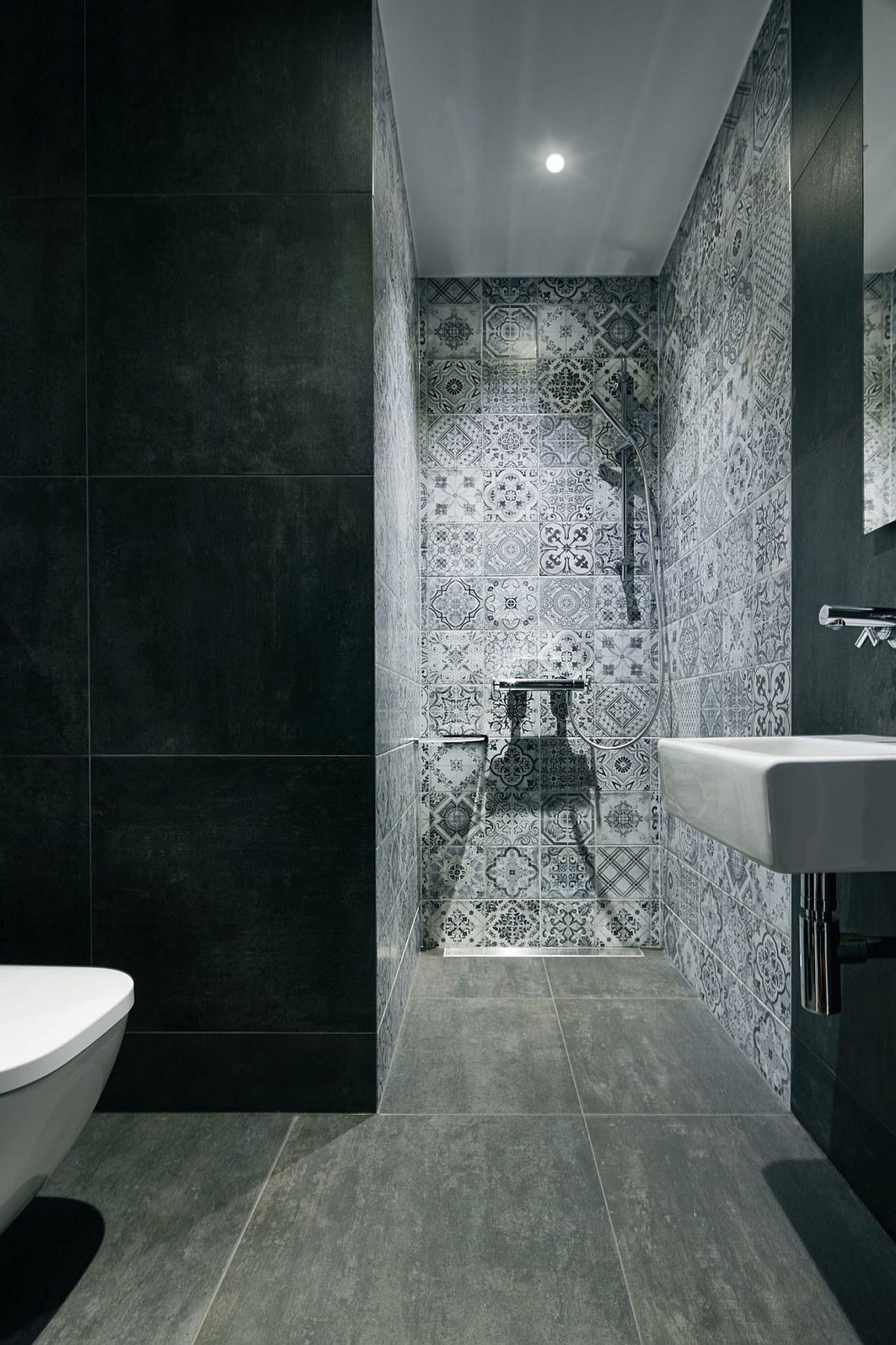 Bathroom in gray with patterened tiles