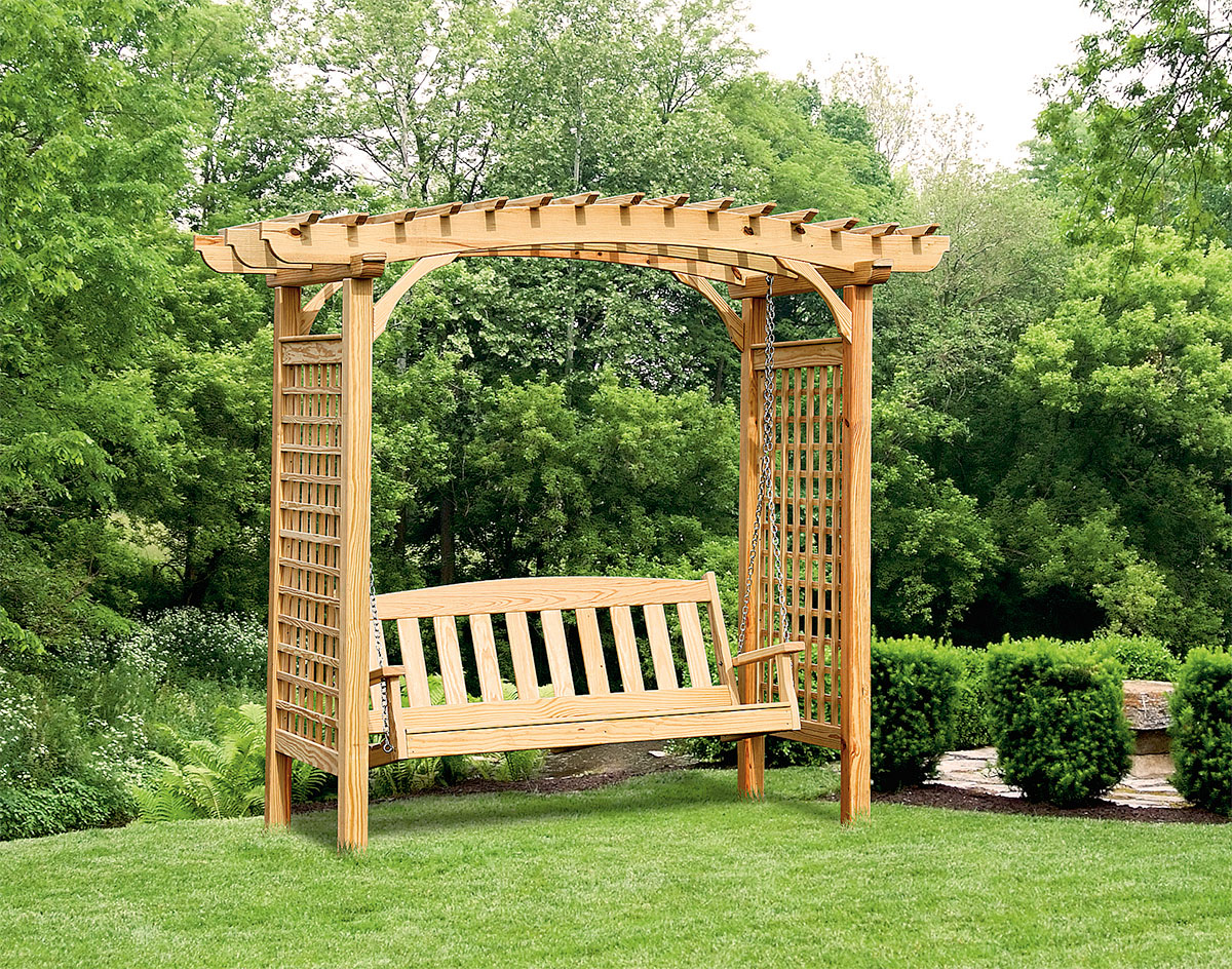 Beautiful garden swing on the edge of the yard