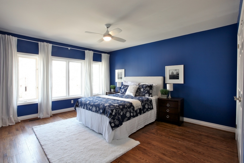 master bedroom with blue walls