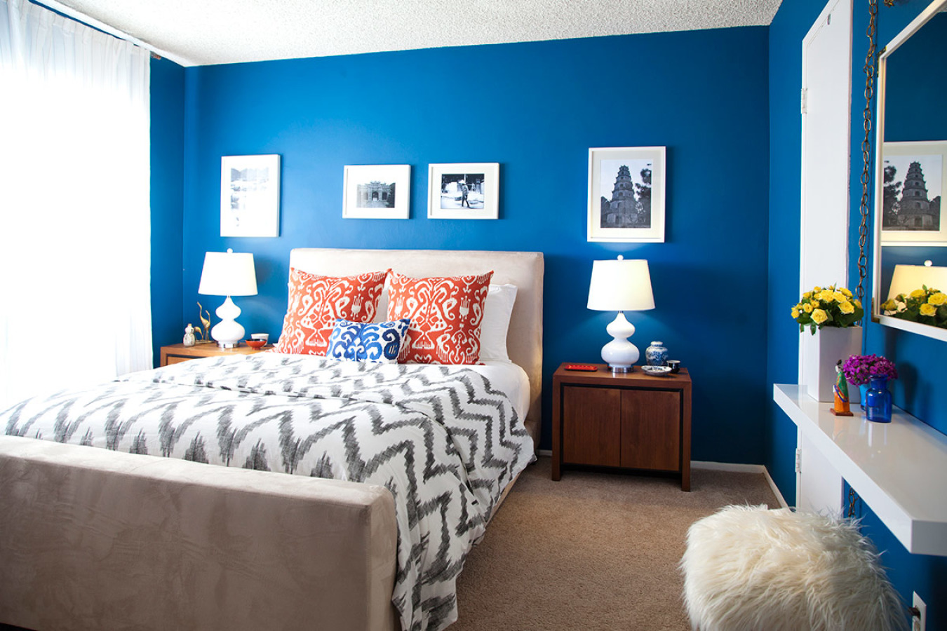 Bright bedroom with strong blue walls