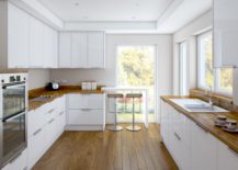 Bright-kitchen-with-a-fair-wooden-countertop--217x155