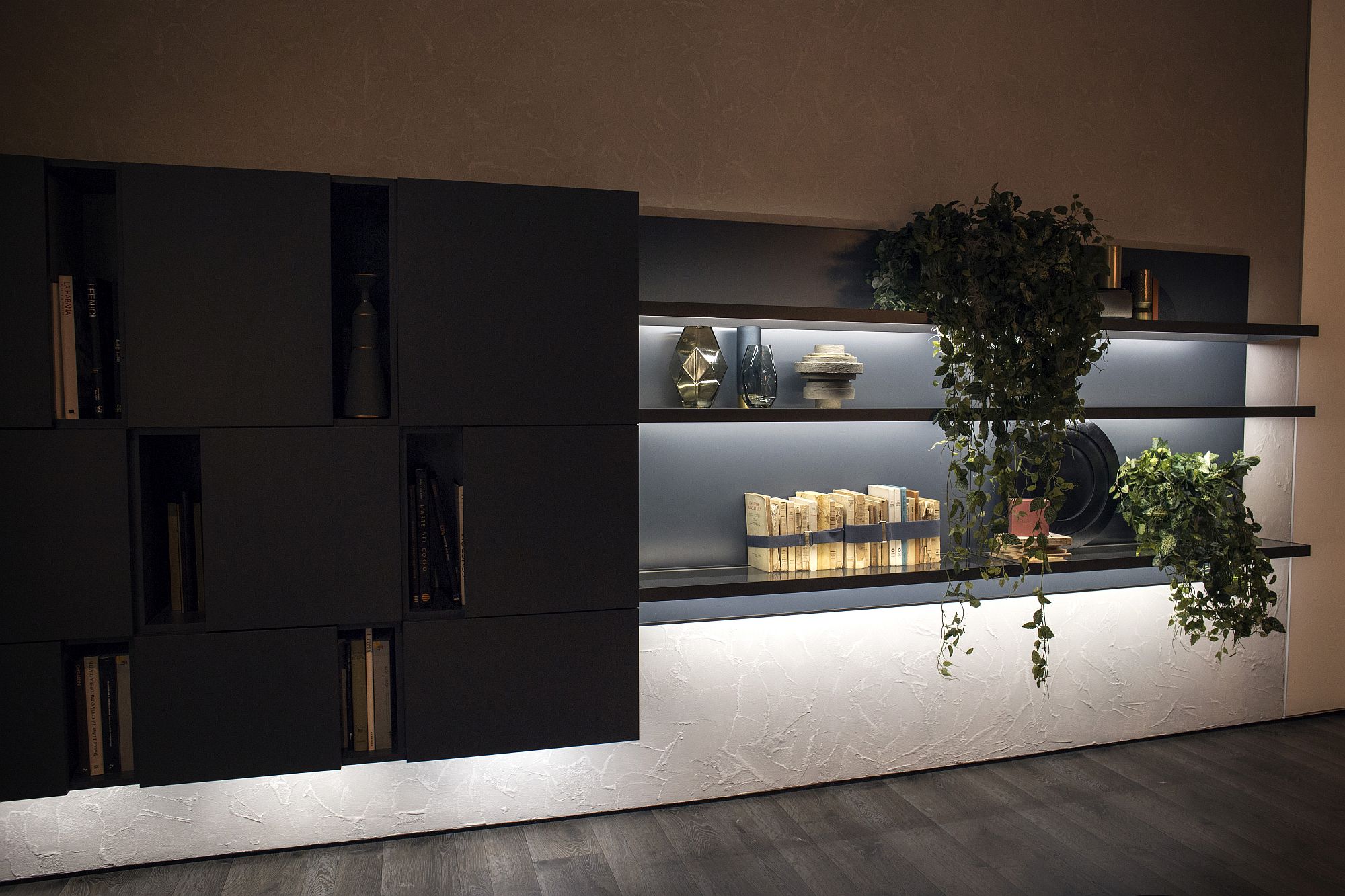 Combine floating cabinets with open shelvinga nd LED lighting for that complete storage and display unit