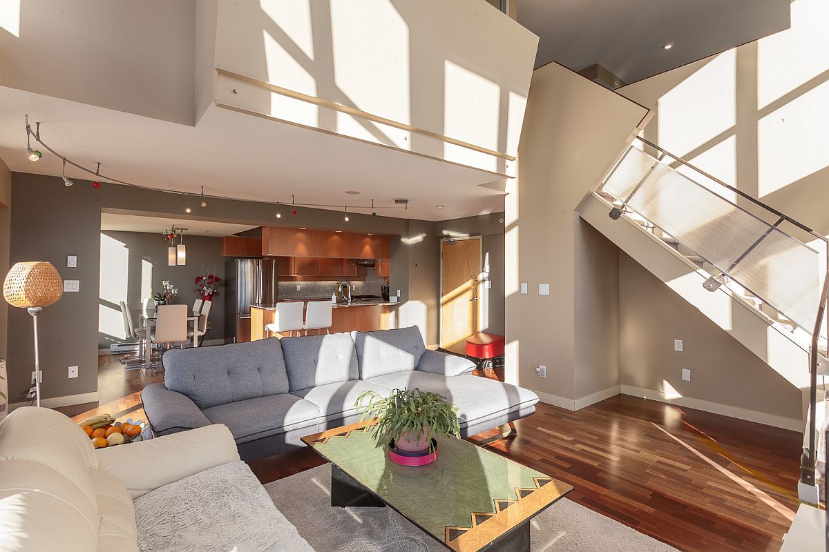 Comfy decor in neutral hues along with cool coffee table