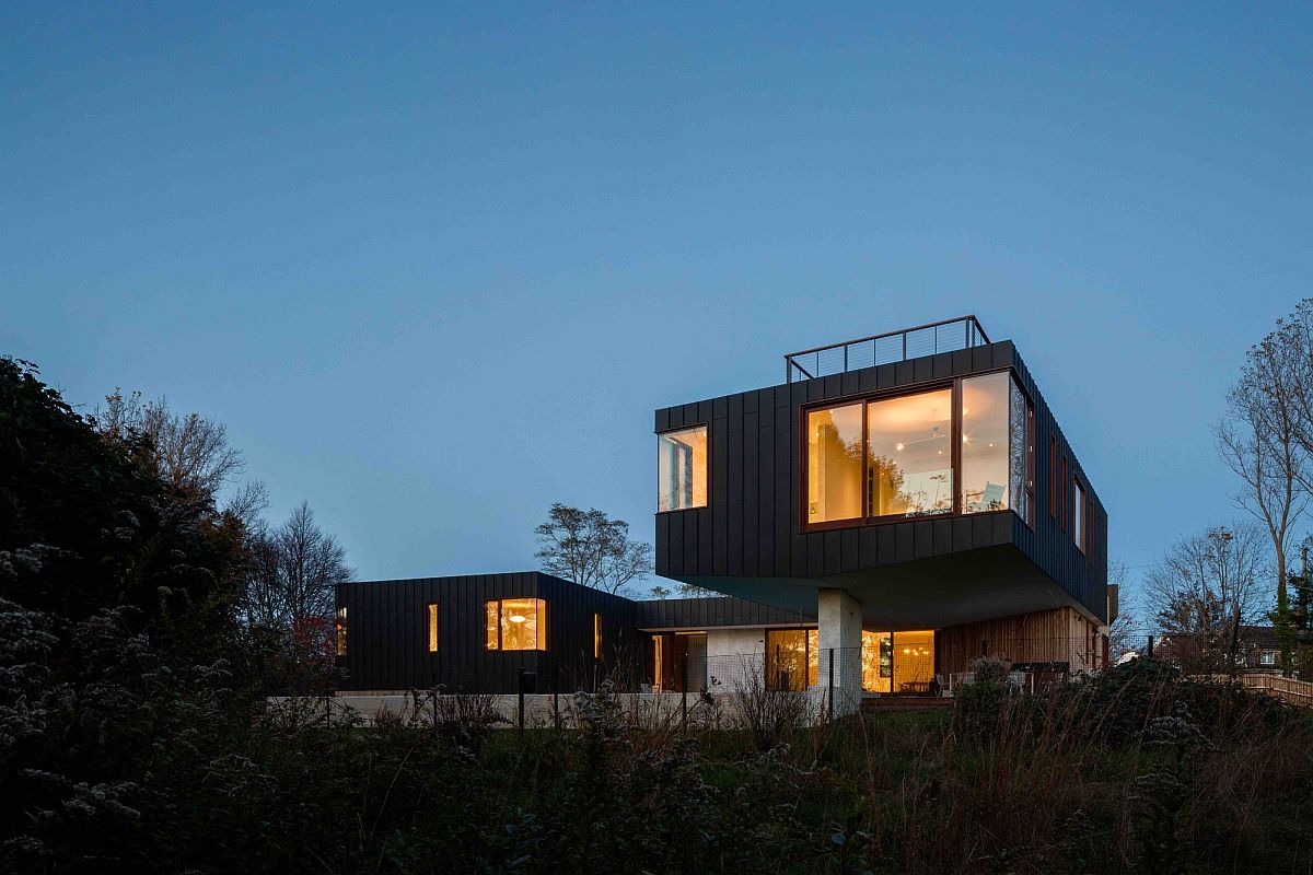 Contemporary home with three different wings and gray exterior