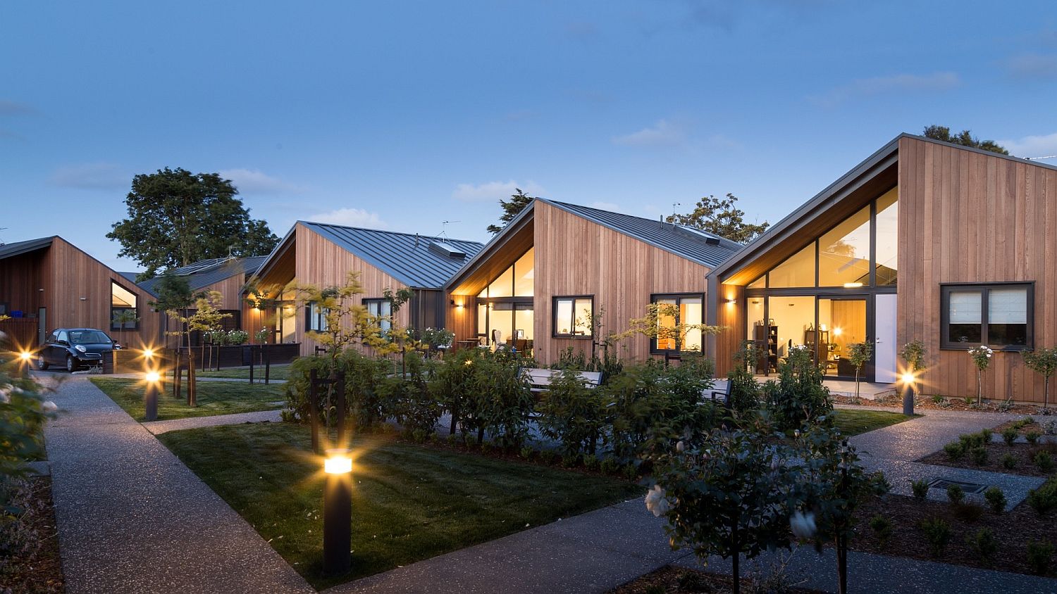 Curated landscape and courtyards around the apartments with lovely lighting