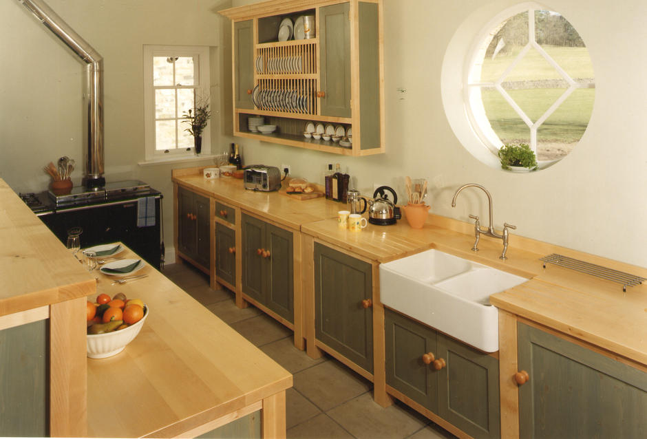 Cute round window in a wooden kitchen