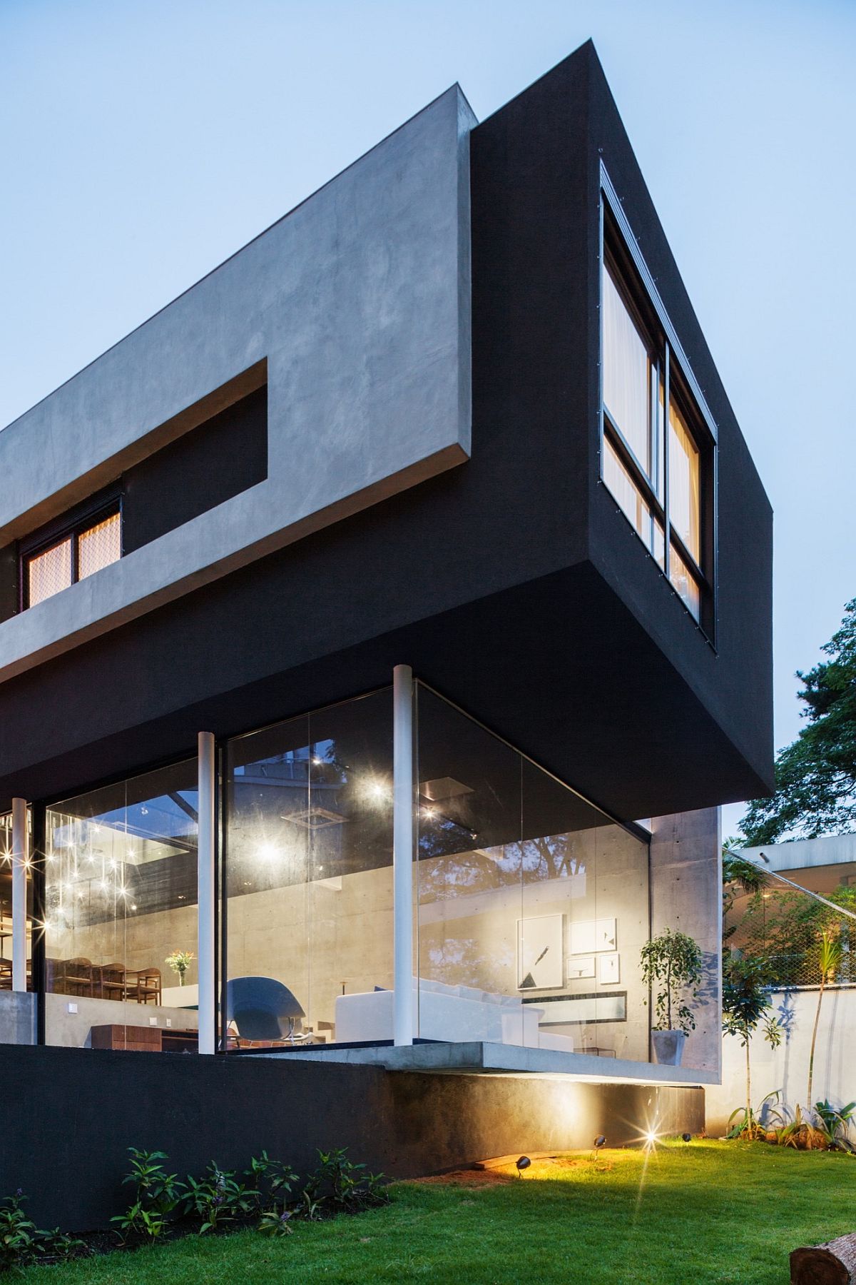 Dark top level of the home with concrete wall