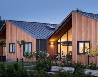 Classic Gable Roofs and a Curated Landscape Enthrall at Mary Potter Apartments