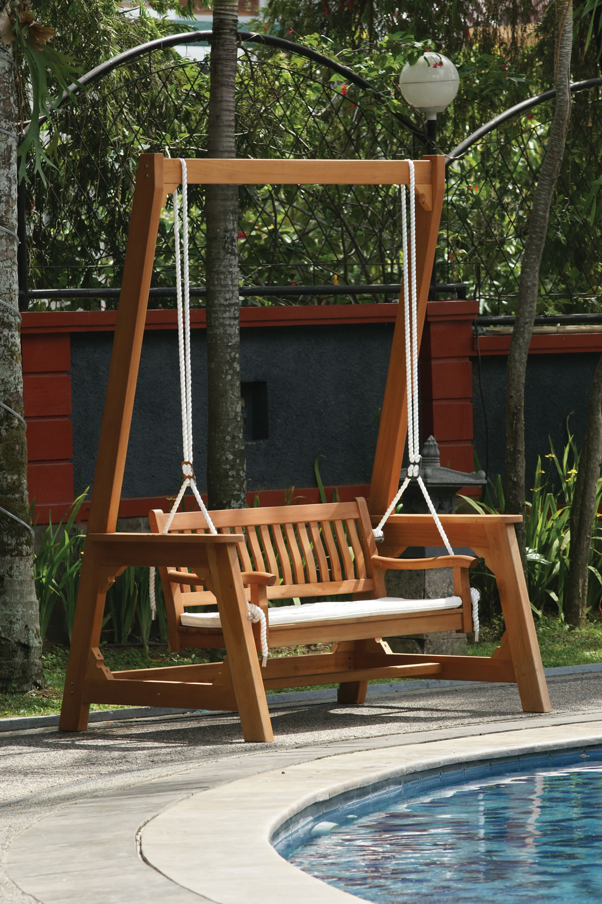 Elegant garden swing by the pool