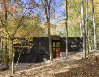 Custom Charred Cedar Exterior Cloaks a Car-Lover’s Dream Retreat