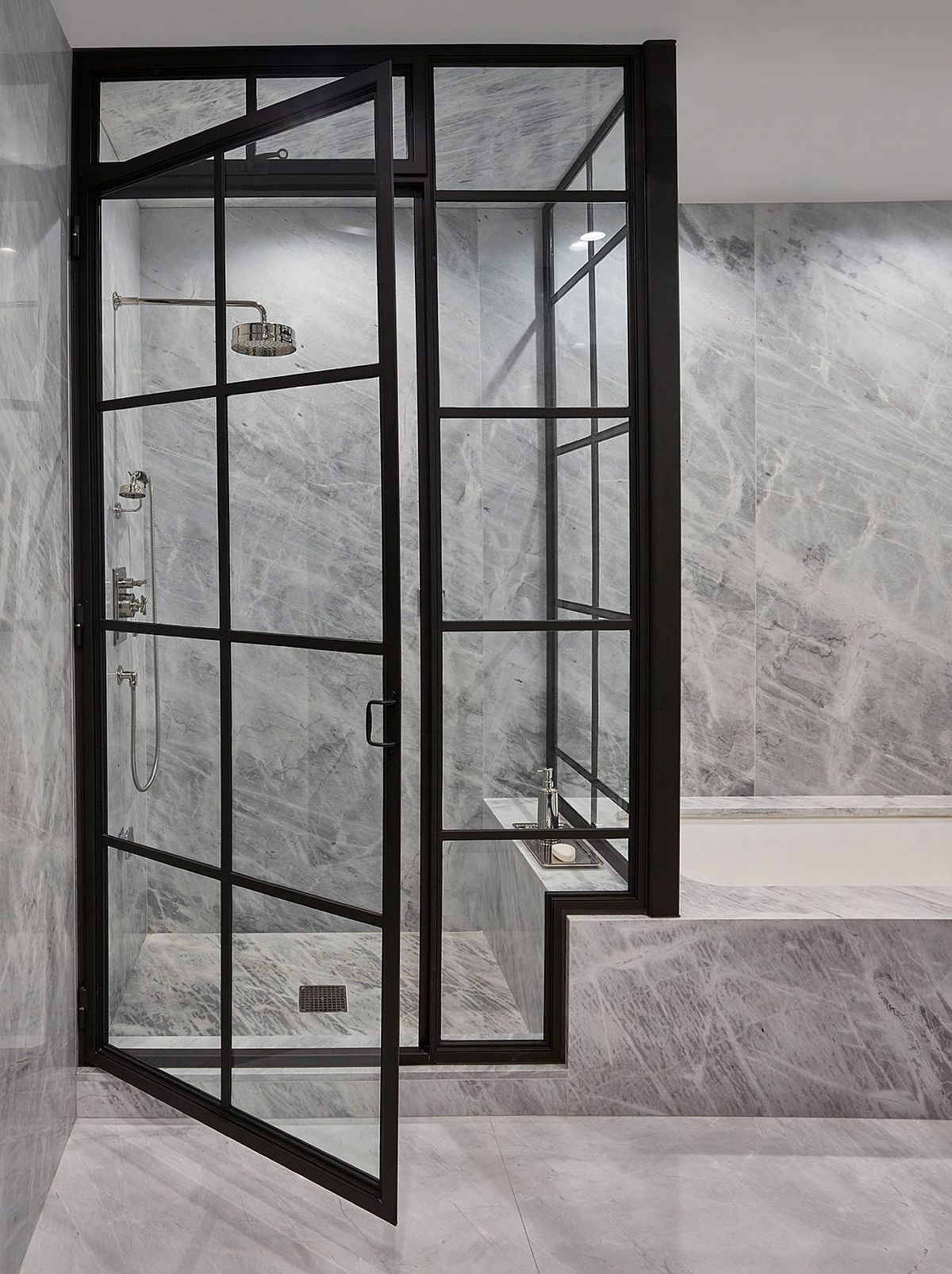 Gray stone and shower area of the penthouse bathroom