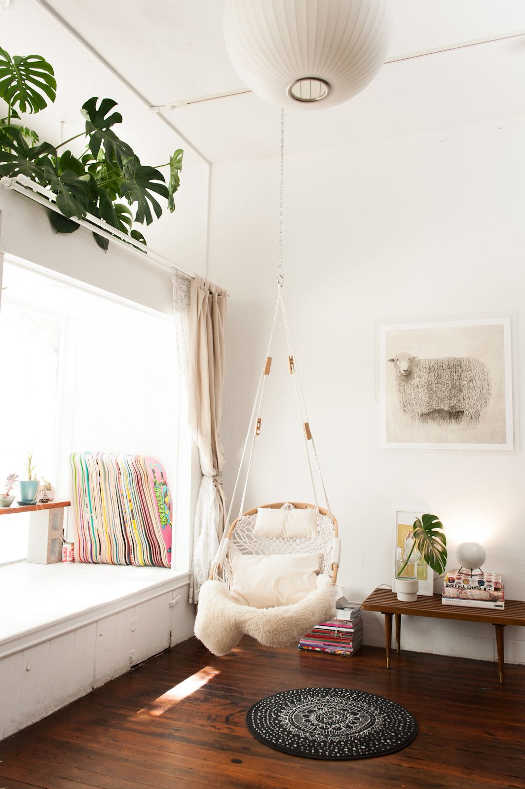 Hanging chair creates a contemporary reading nook