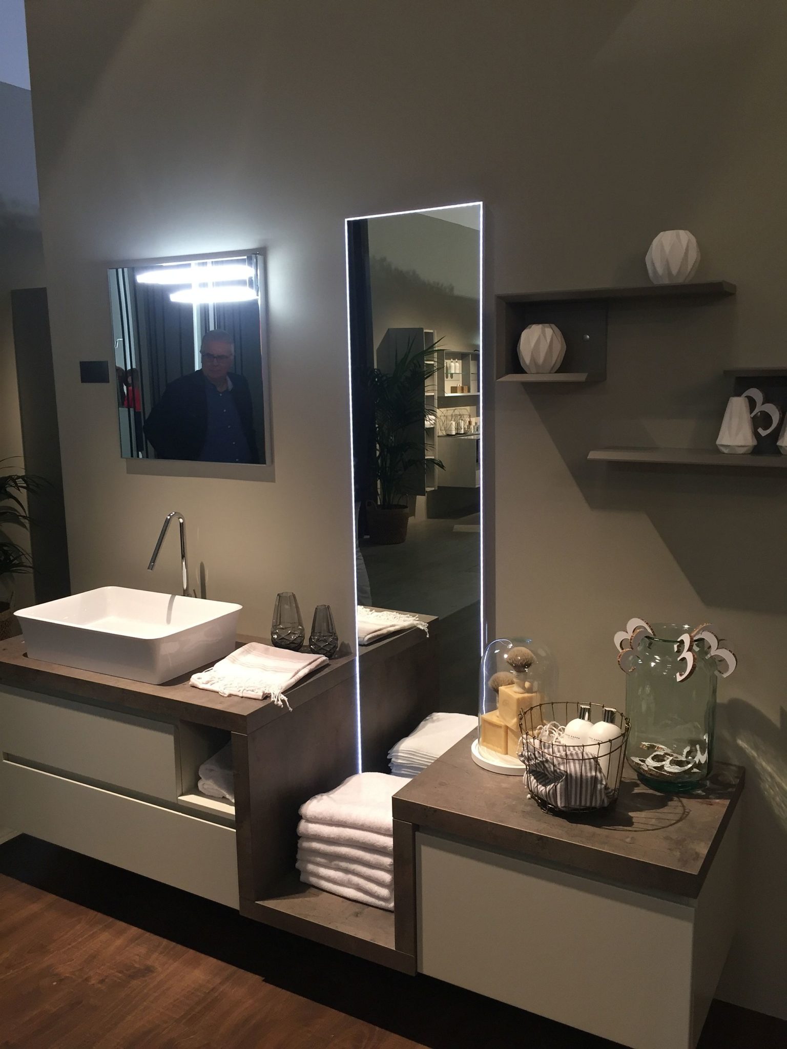 Innovative bathroom vanity design offers plenty of storage space along with open shelving