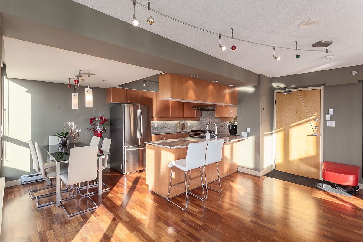 Kitchen and dining area with space-savvy modern sheen