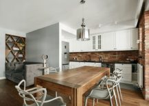 Kitchen-with-white-cabinets-and-exposed-brick-walls-217x155