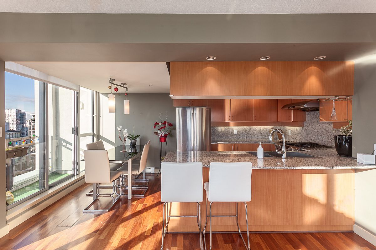 Kitchen with wooden cabinets, granite counters and stainless steel appliances