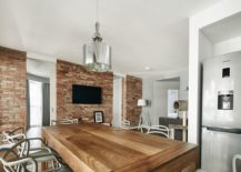 Large-dining-table-in-wood-and-stylish-contemporary-chairs-217x155