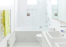 Light-filled-modern-bathroom-in-white-217x155