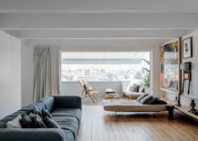 Living-room-connected-with-small-balcony-offers-wonderful-views-of-Lisbon-217x155