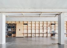 Milled-timber-multi-functional-wall-inside-the-modern-industrial-office-217x155