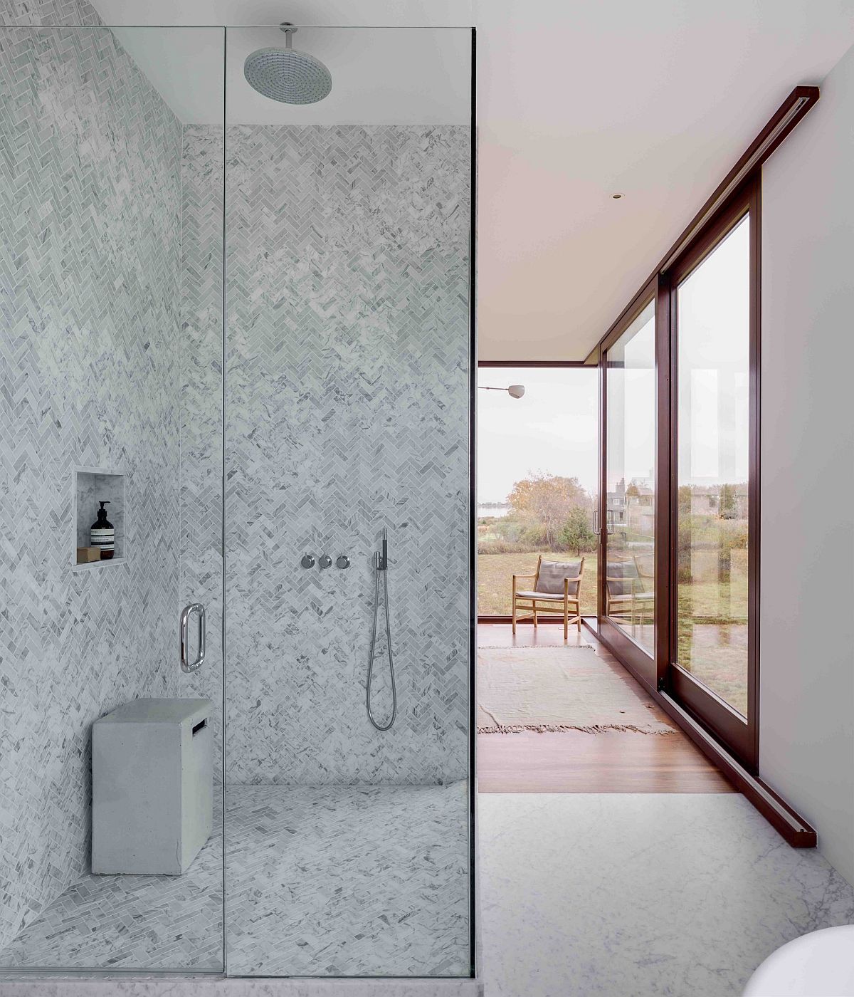 Modern master bedroom in white with corner shower area