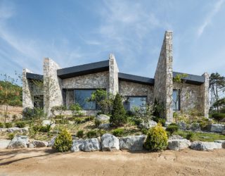 The Layers: Serene Rustic Retreat with Stone Walls Blends into the Landscape