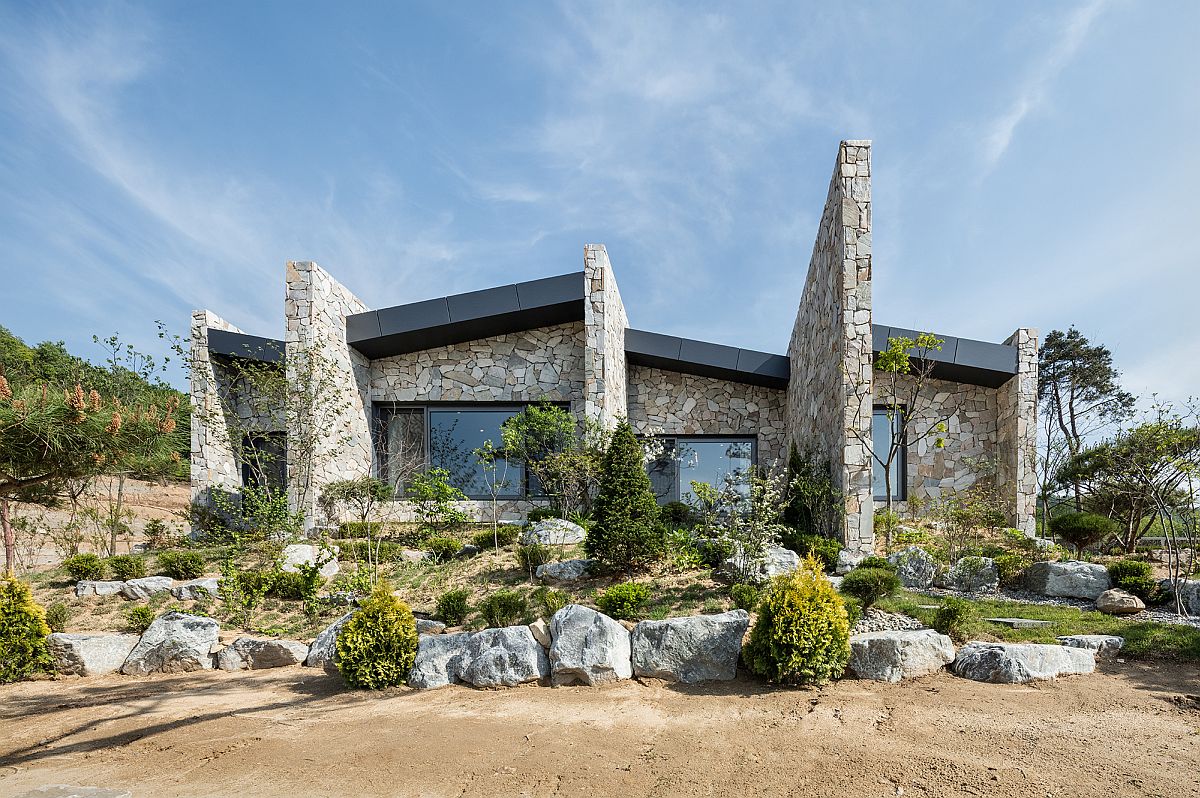 Natural-stone-combined-with-glass-windows-creates-a-distinctive-facade