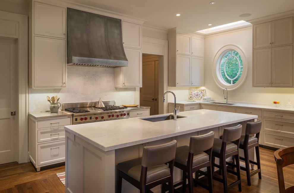 Neutral kitchen with a charming round window