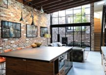 Open-and-industrial-living-space-with-brick-walls-217x155