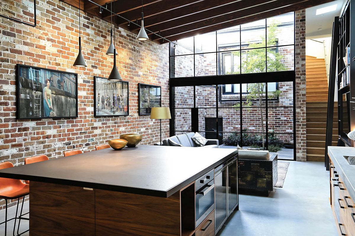 Open and industrial living space with brick walls