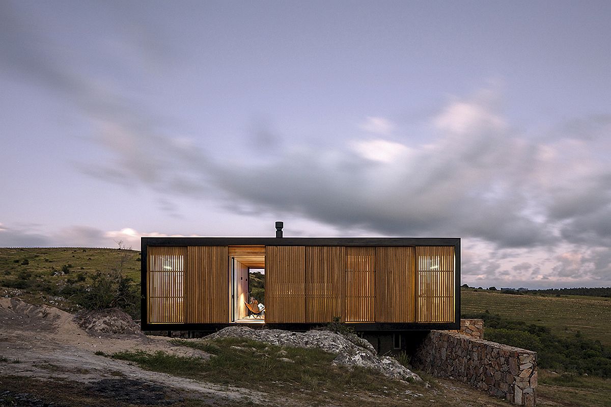 Prefab on the edge of an olive field offers a tranquil retreat