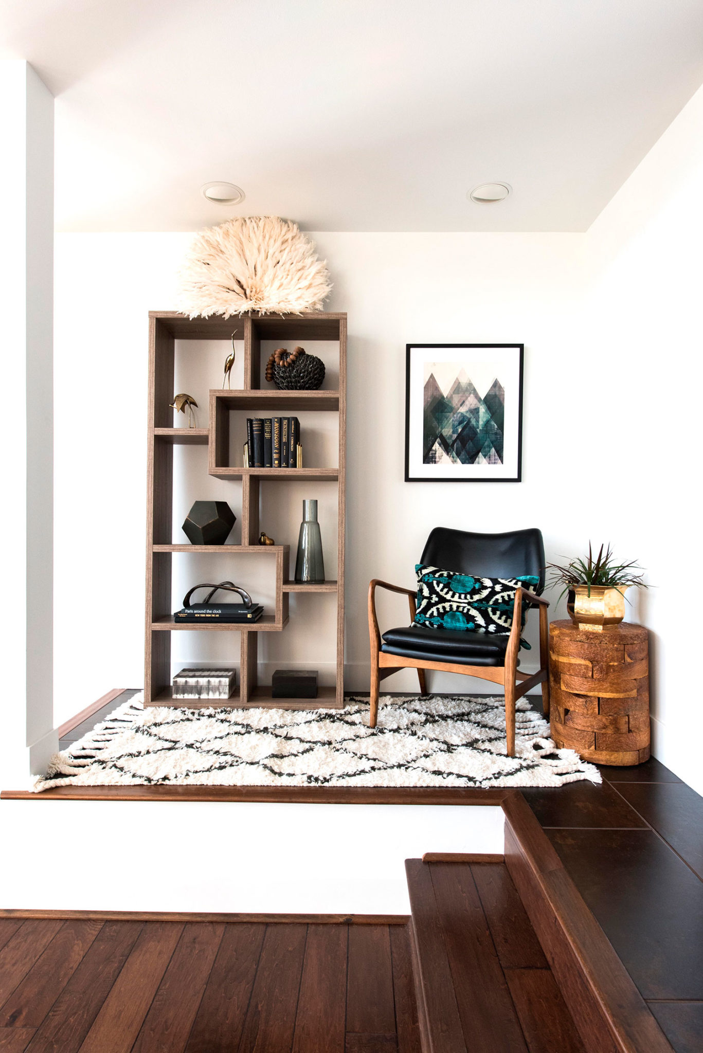 Raised reading nook with a contemporary bookcase