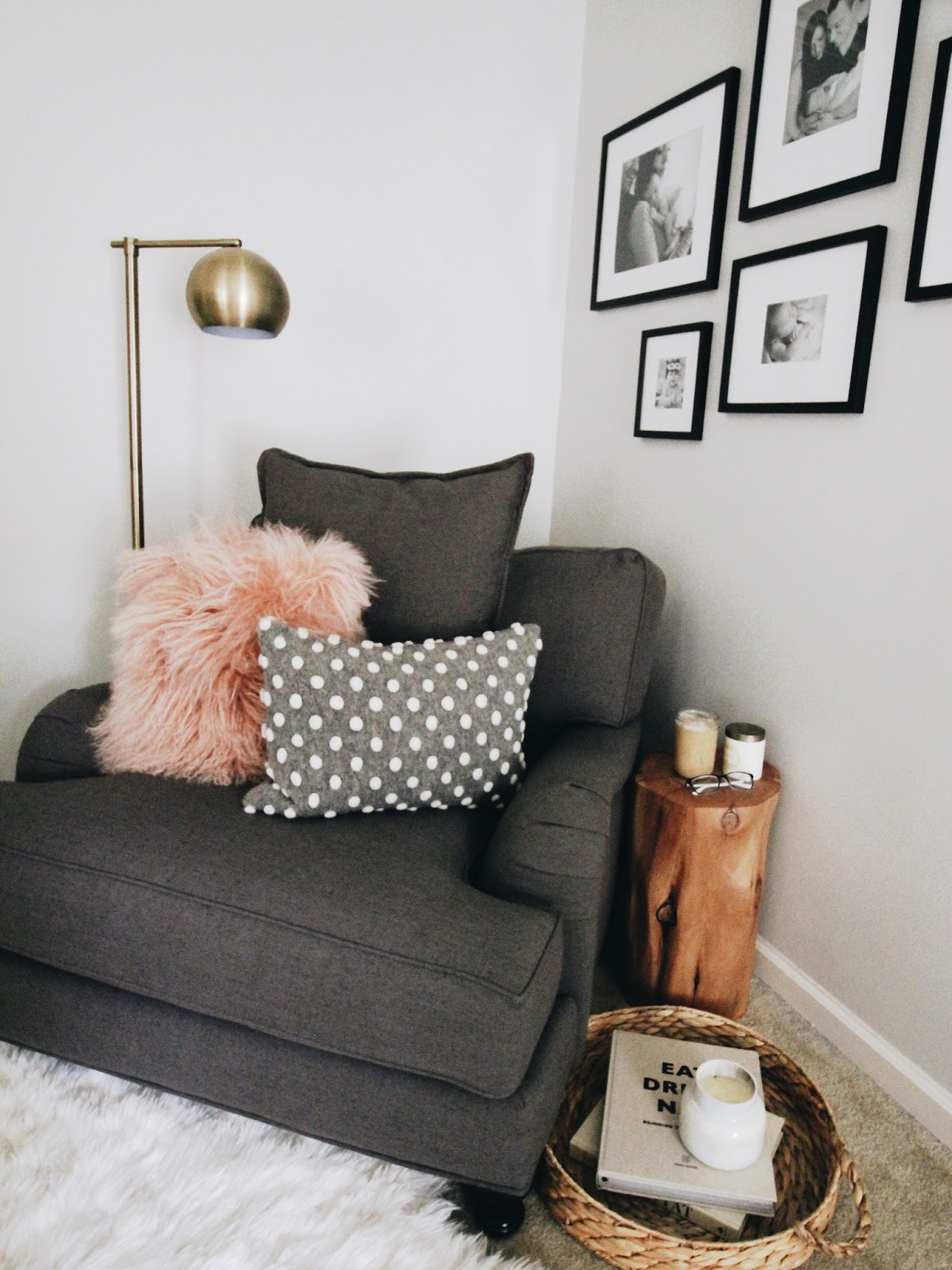 Reading nook with a black and white wall gallery