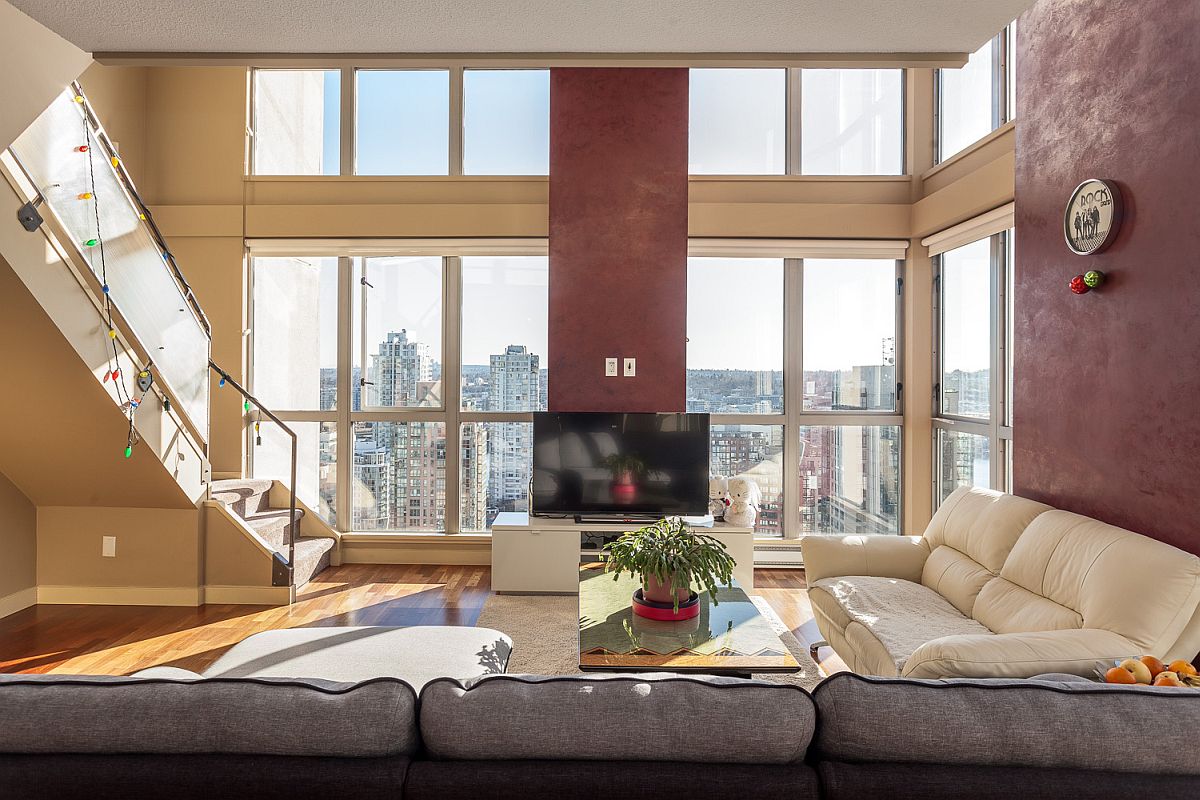 Red adds glamor to the large loft living room