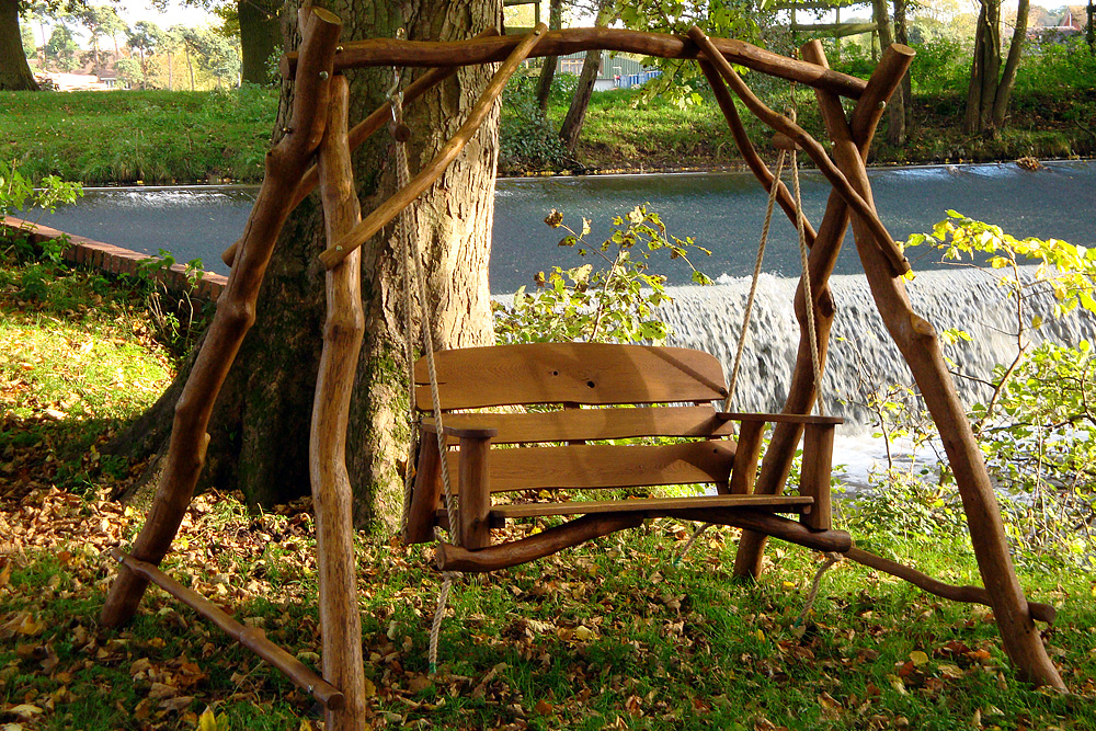 Rustic garden swing for a country backyard