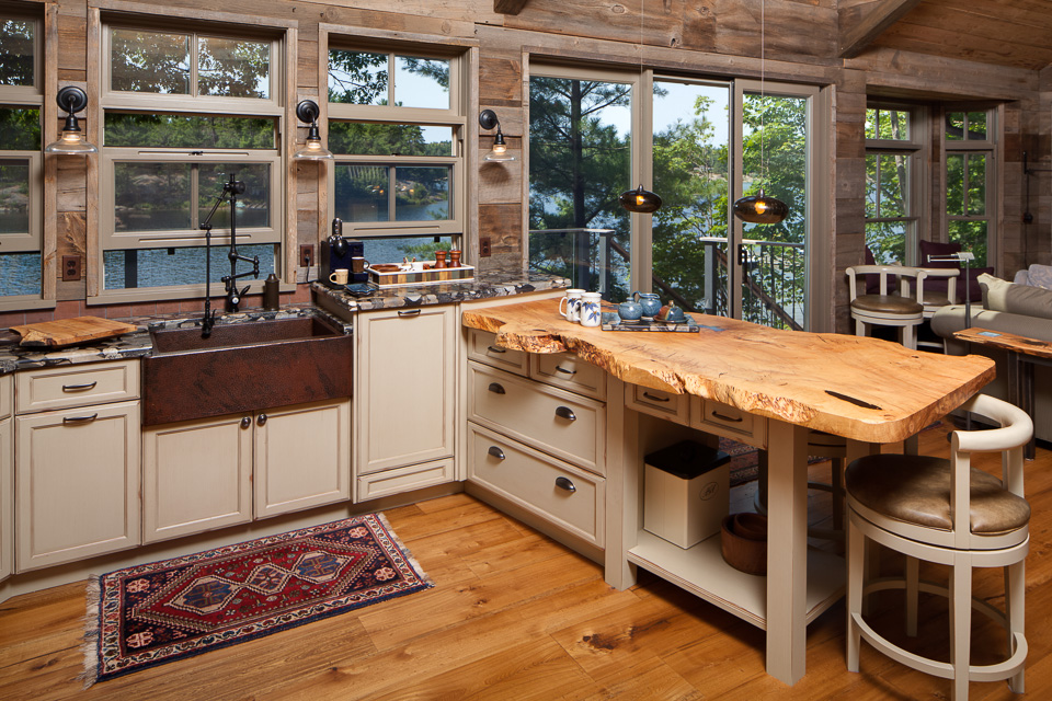 Rustic kitchen with a pale raw-edge wooden countertop