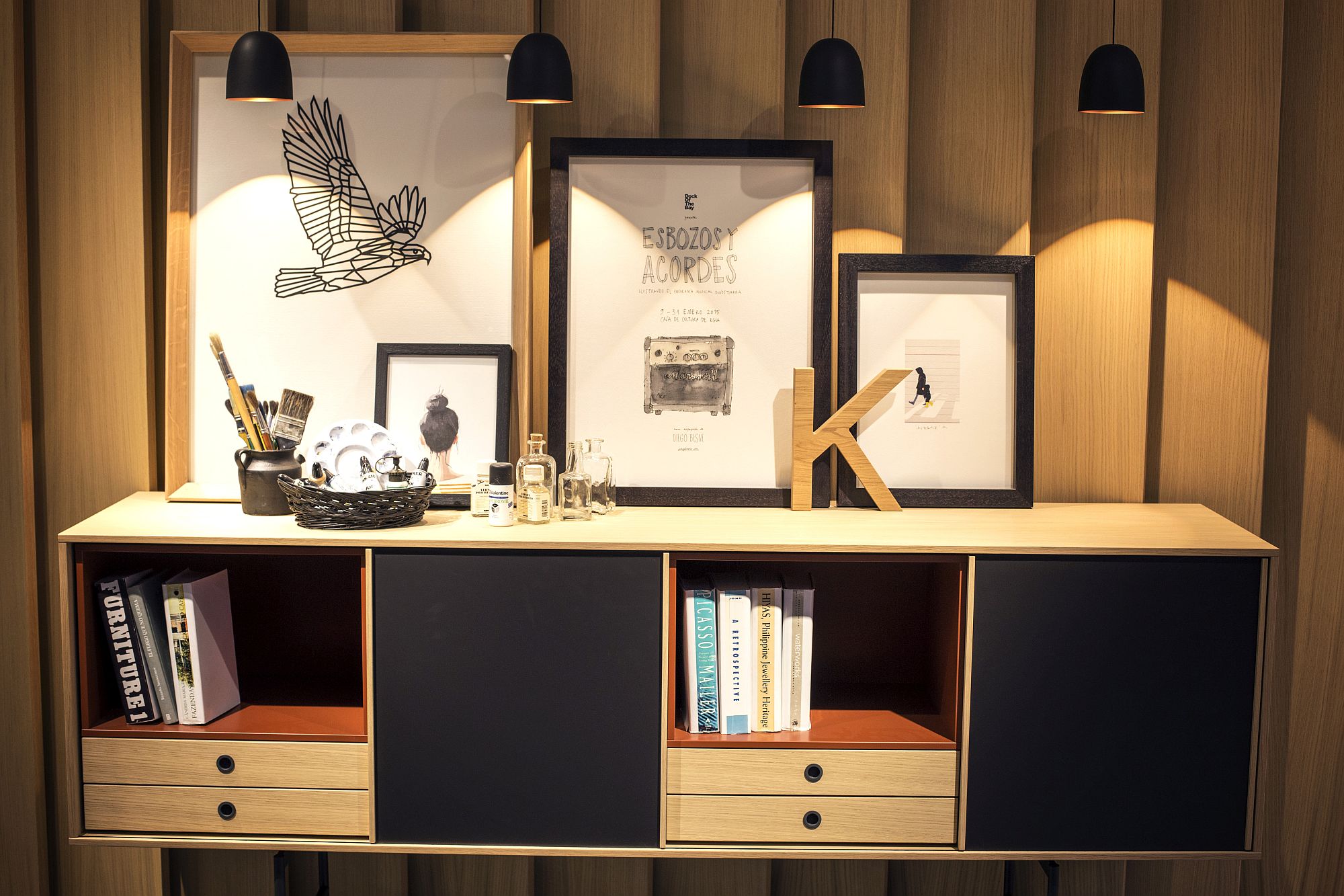 SIdeboard and casually placed art pieces illuminated beautifully - Treku