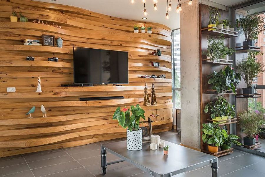 Shelves next to the TV add 3D effect to the accent wall