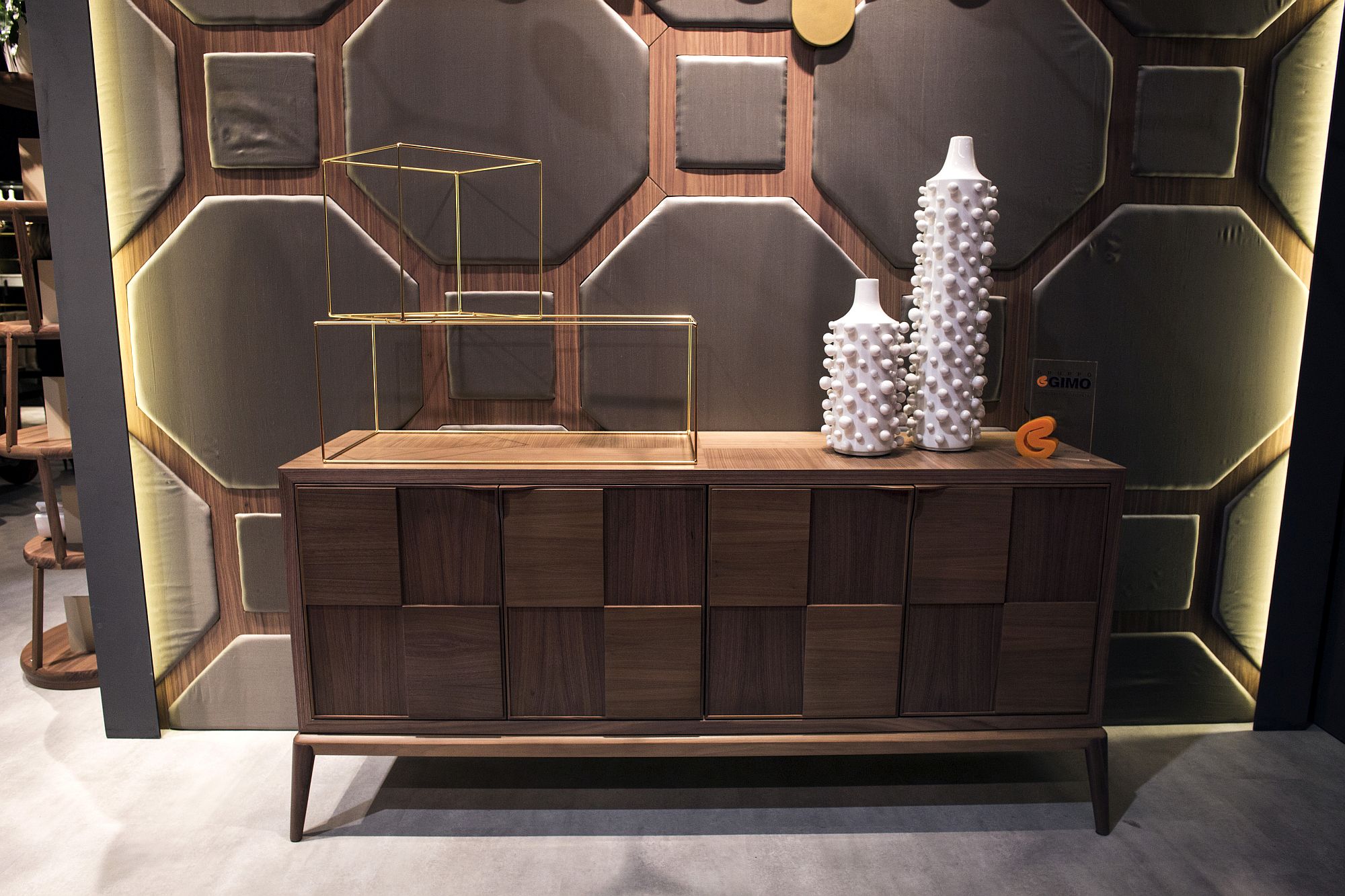 Sideboard and even the backdrop add geo style to the living room