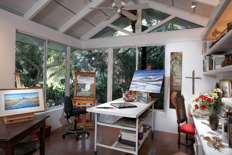 home art studio with large windows and high ceilings