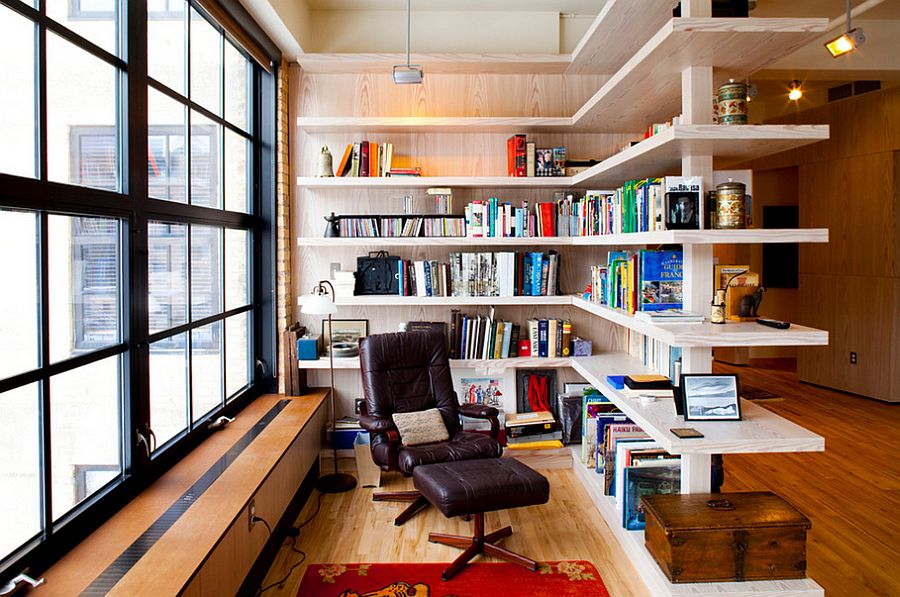 Smart shelving creates a room within a room along with shelf space for books