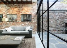 Spacious-living-area-connected-with-the-garden-has-a-modern-industrial-vibe-217x155