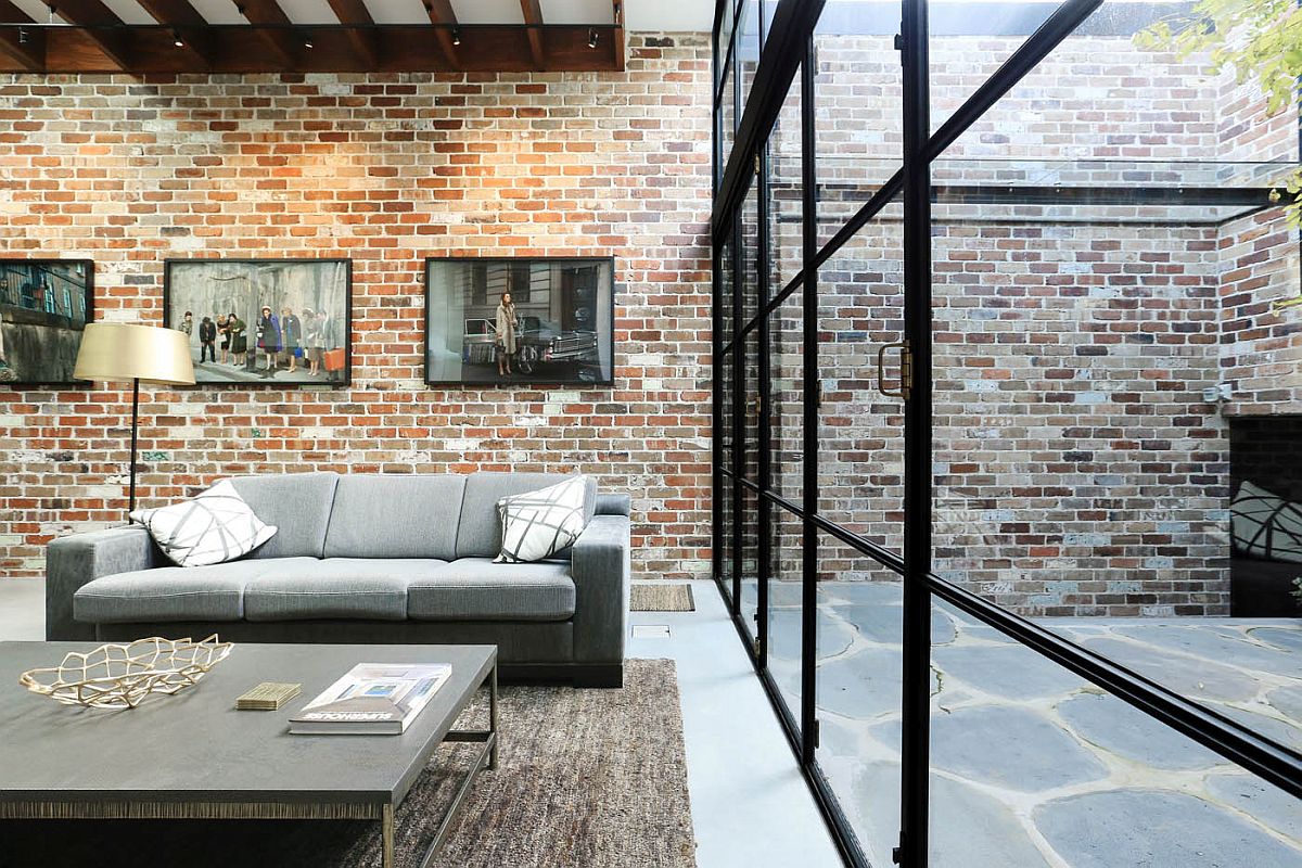 Spacious-living-area-connected-with-the-garden-has-a-modern-industrial-vibe
