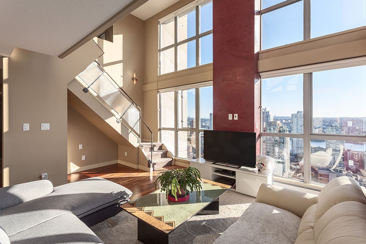 Spacious living room of the loft with a view of Downtown Vancouver