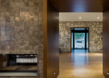 Stone-walls-and-wooden-floor-usher-in-ample-textural-contrast-217x155