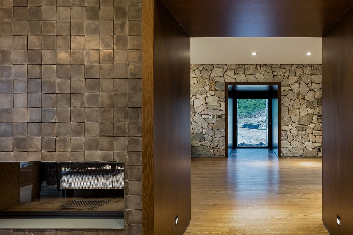 Stone walls and wooden floor usher in ample textural contrast