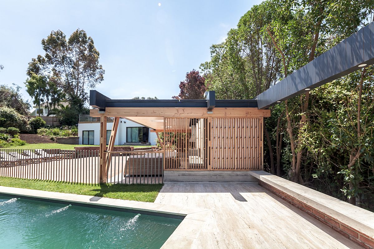 Timber framework keeps out harsh sunlight along with sliding doors